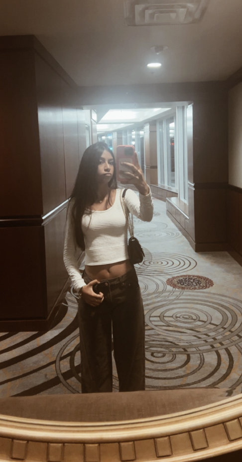 Pragna mirror moment in cozy cardigan