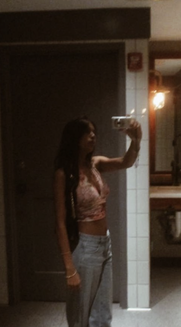Pragna in pink top with mirror selfie